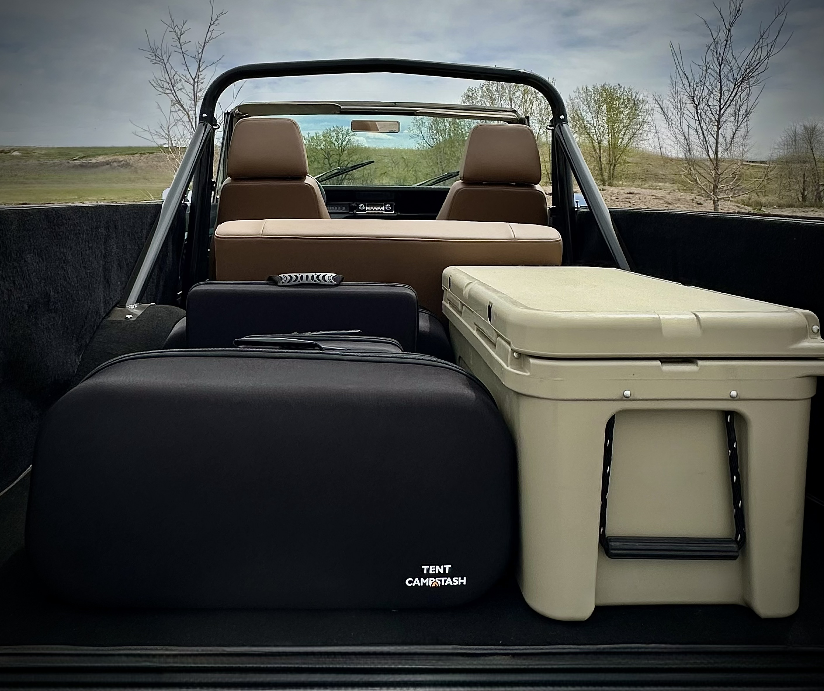Structured Campstash case packed neatly with vehicle camping gear