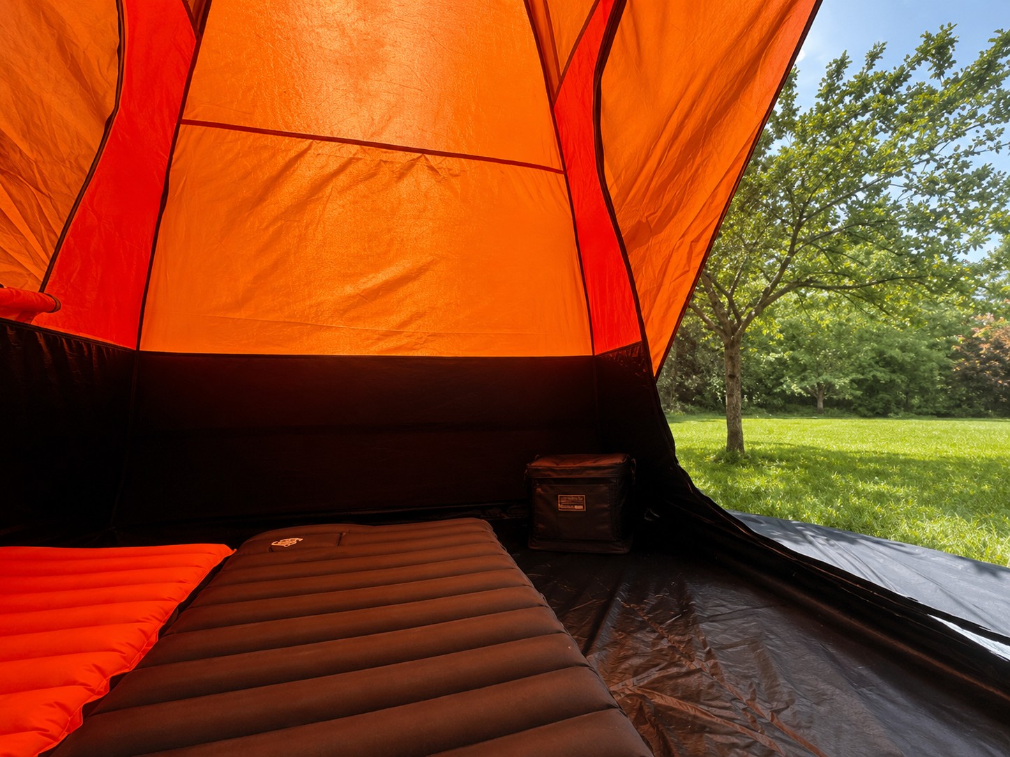 Campstash tent interior with two sleeping cots and camping gear